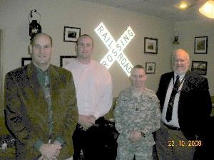 In October, the reactivated chapter elects new officers, including (l-r) Doug Williams, chapter president; Casey Barrett, chapter secretary; Capt. Charles Cain, USA, chapter executive vice president; and Dick Brown, outgoing president.
